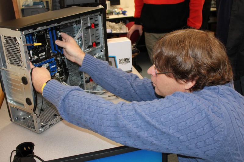Male student working on a computer