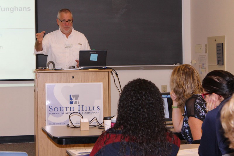 This photo shows Dave Yunghans, Constant Contact Regional Director, speaking to the seminar attendees