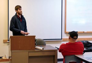 Engineering Technology Graduate Tanner Hutchison speaking to first year Engineering Technology students