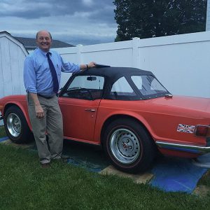 Dave Andrus and his red sports car