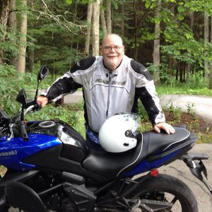 Jim Colbert riding his motorcycle
