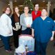 Health Careers Club members holding donations for a local Nursing facility