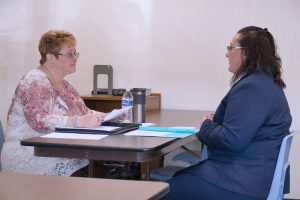 Sandy Cramer, Co-Owner of the HR Office, Inc., conducts a mock job interview with a South Hills student.