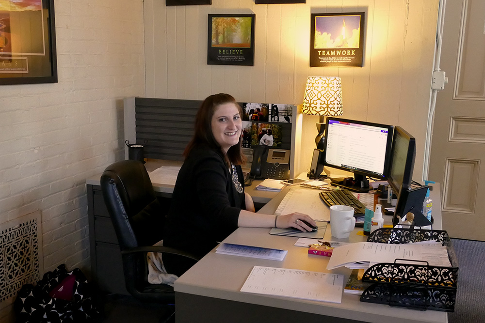 South Hills alumna MacKenzie Huntsman is shown at the Huntingdon County Chamber of Commerce, her place of employment.