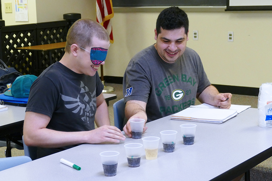 BAMM & IT students participate in a soda taste-test experiment.