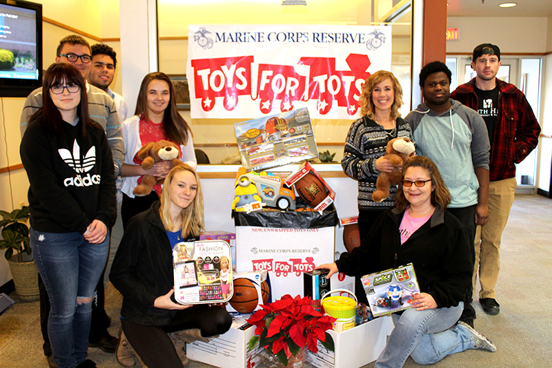 Phi Beta Lambda Members with toys for Toys for Tots