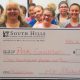 Medical Assistant students with donation check