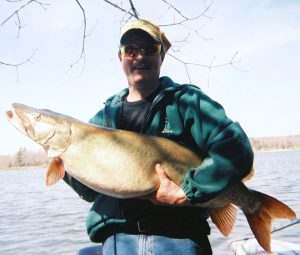 Mark Gentzel with a huge fish he caught