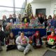 This photo shows Altoona students with toy donations for Toys for Tots